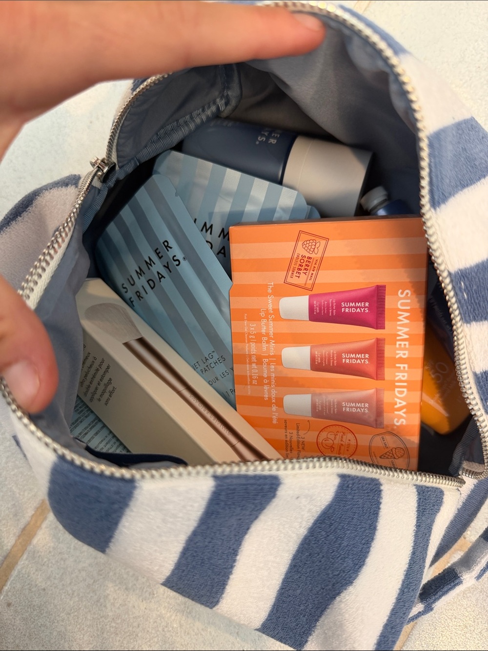 Summer Fridays Pouch filled with products